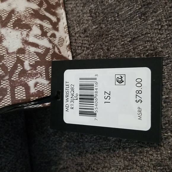 Nwt DKNY medium brown graffiti wristlet. Retails $78 - Picture 7 of 8